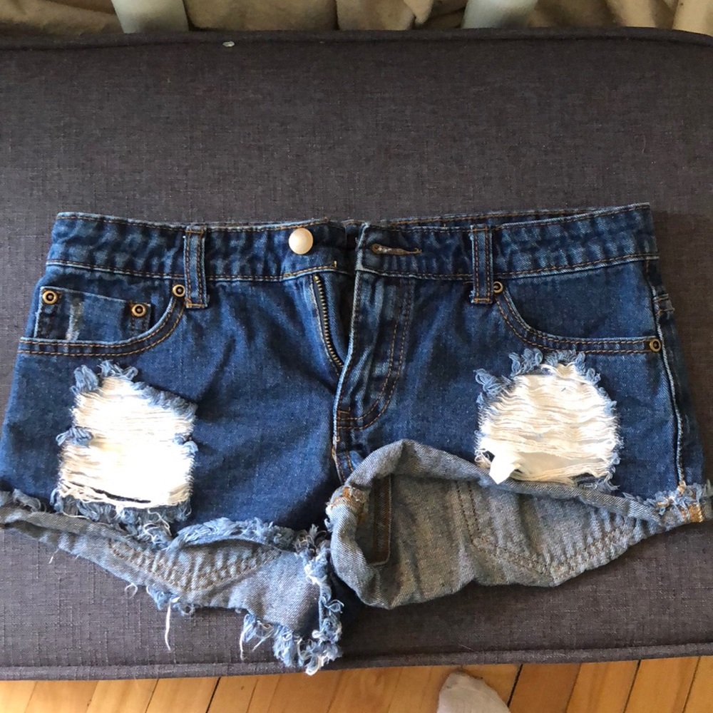 Distressed denim shorts